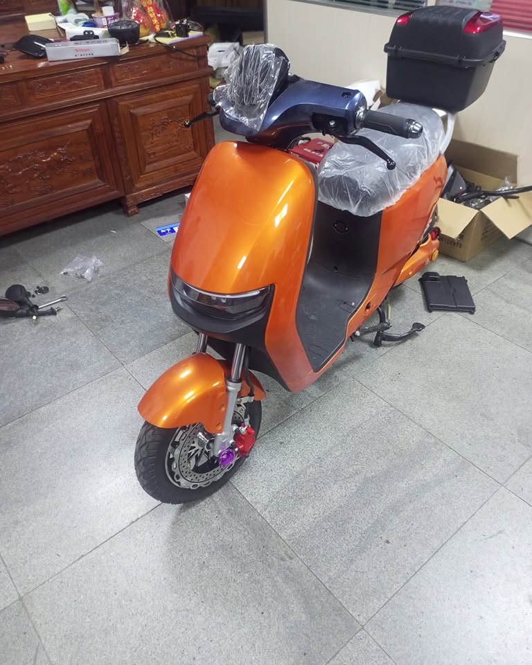 Orange electric scooter